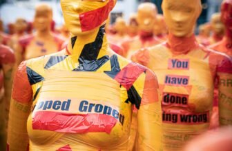 man in yellow and red jersey shirt
