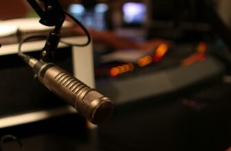 black and gray microphone with stand