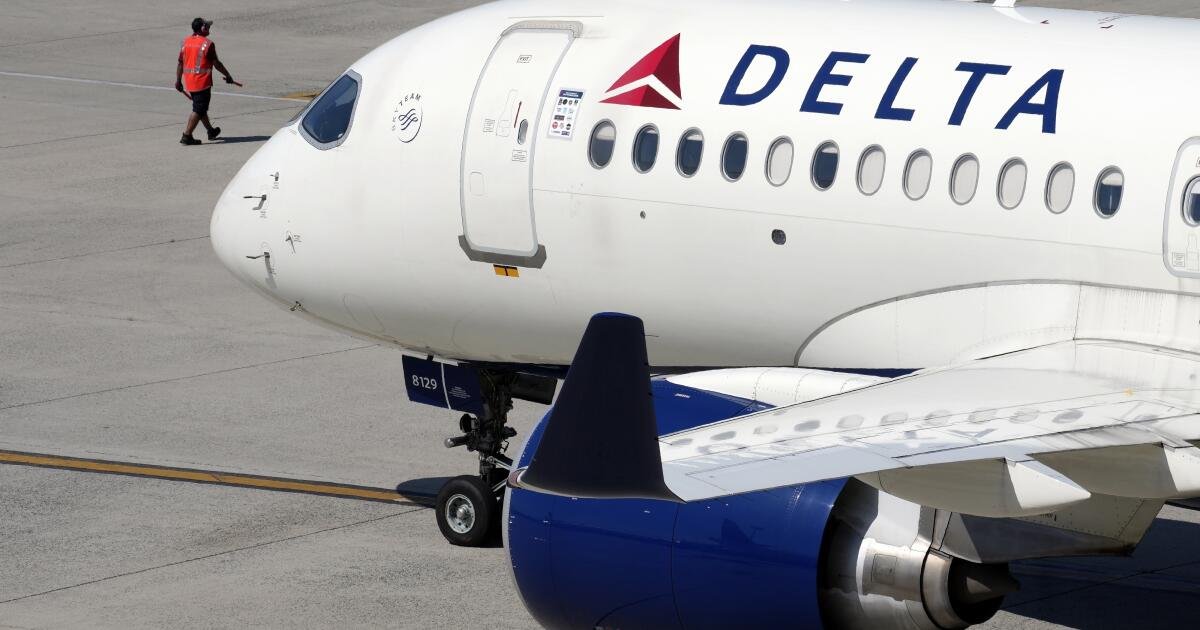 Pilot accused of child sex crimes is taken from cockpit minutes after flight lands in California