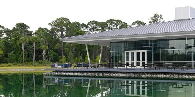 Step Inside KPMG's Florida Lakehouse, From the Bedrooms to the Bar