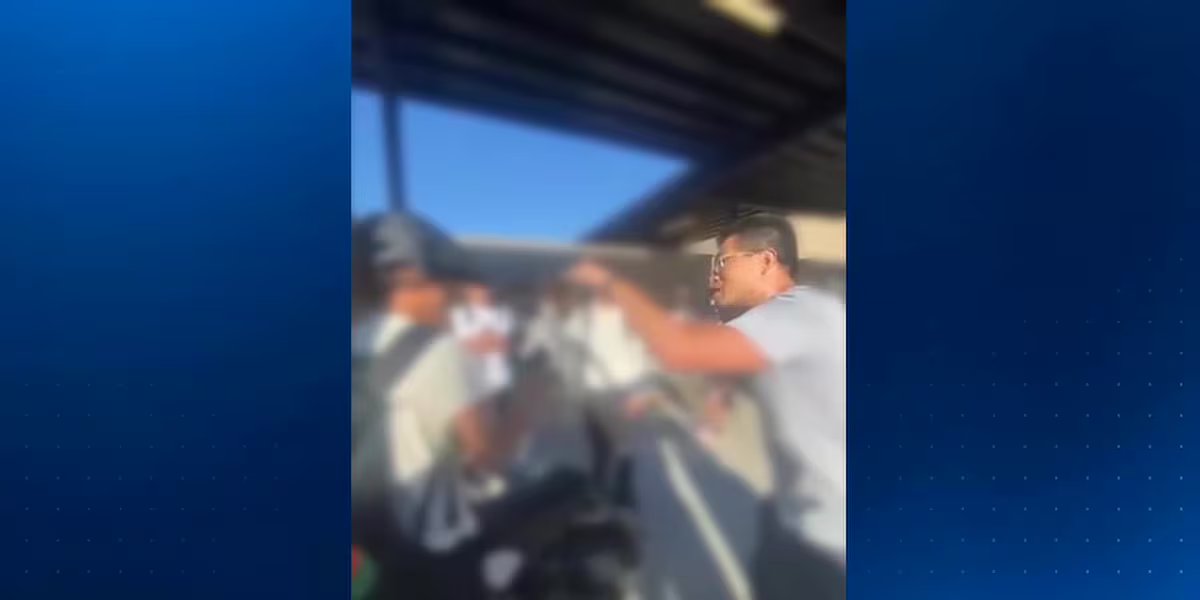 College professor arrested after slapping bicycle helmet off child during argument, police say