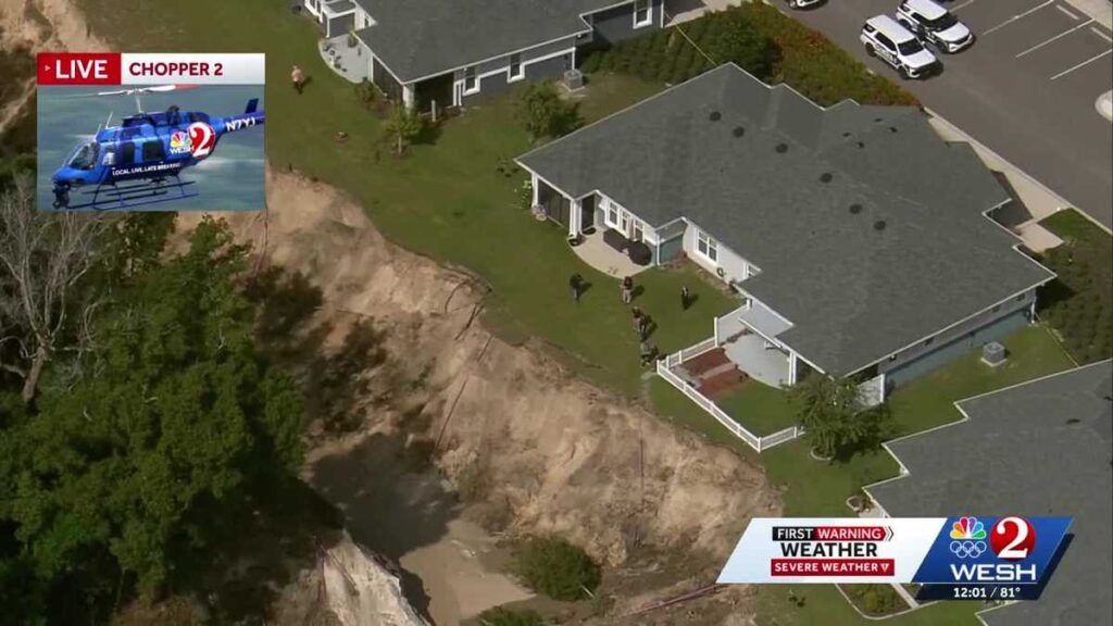 Ground washes out feet from homes in florida after torrential