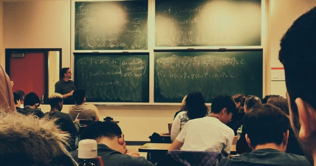 Teacher teaching in classroom by shubham sharan on unsplash.jpeg