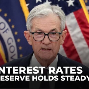 US Federal Reserve holds interest rates steady despite political pressure