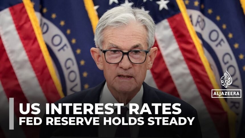 US Federal Reserve holds interest rates steady despite political pressure