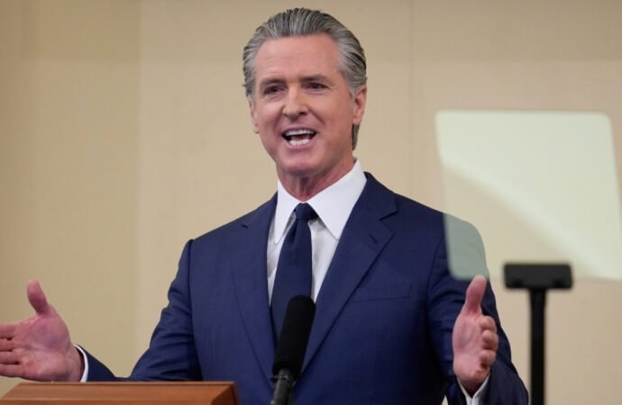 Gov. Gavin Newsom takes heat from Republicans and LGBTQ+ lawmakers during book tour