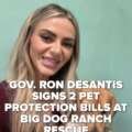 Gov. Ron DeSantis signed two new Florida bills aimed at protecting pets during a visit to Big …