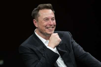Elon musk smiling.jpg