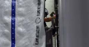 Workers begin removing Trump's name from the Kennedy Center – LAist