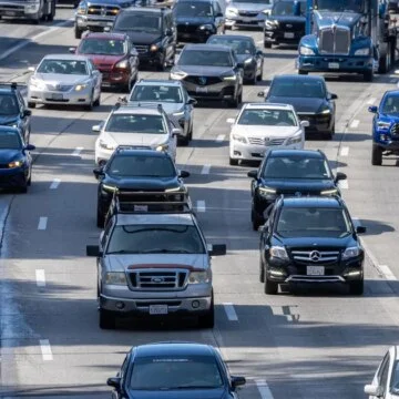 Millions hit the road for 4th of July travel, but they’ll face high gas prices, heat over the weekend, AAA says