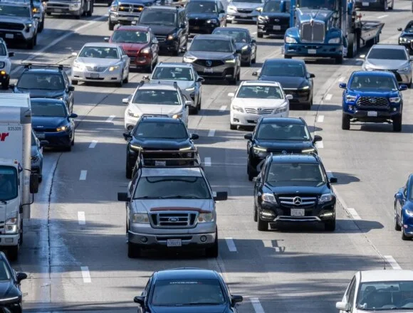 Millions hit the road for 4th of July travel, but they’ll face high gas prices, heat over the weekend, AAA says